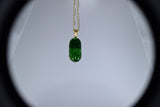 Oblong Kelly Green Pendant With Yellow Gold-Plated Chain and Matching Earrings